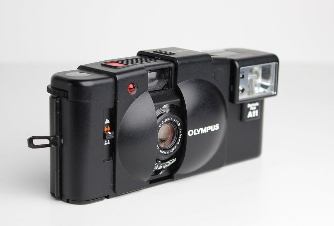 Olympus XA2 35MM Rangefinder film camera with Flash attachment. For Color & B&W film (Renewed)