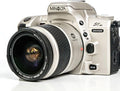 MINOLTA Maxxum StSi 35MM SLR film camera with Minolta MD Auto focusing Mount Lens system and Built-in flash. Included AF/MF lens. (Renewed)