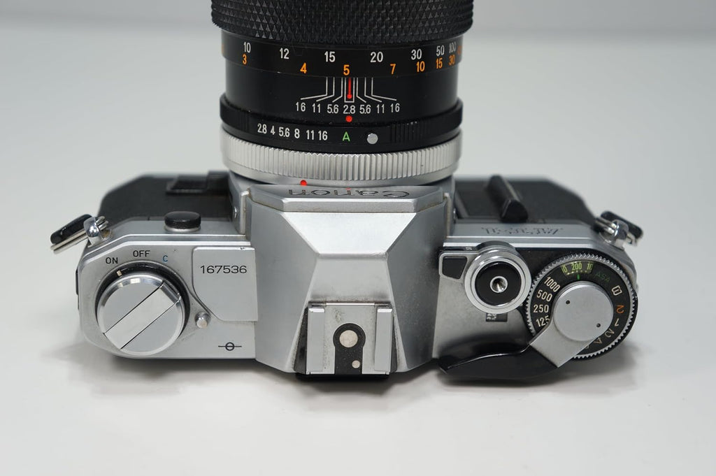 Canon AT-1 Chrome 35mm SLR Film Camera With Zoom FD mount lens. (Renewed)