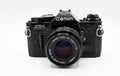 Canon AE-1 Program 35mm SLR Camera with 50mm 1:1.8 Lens (Black) (Renewed)