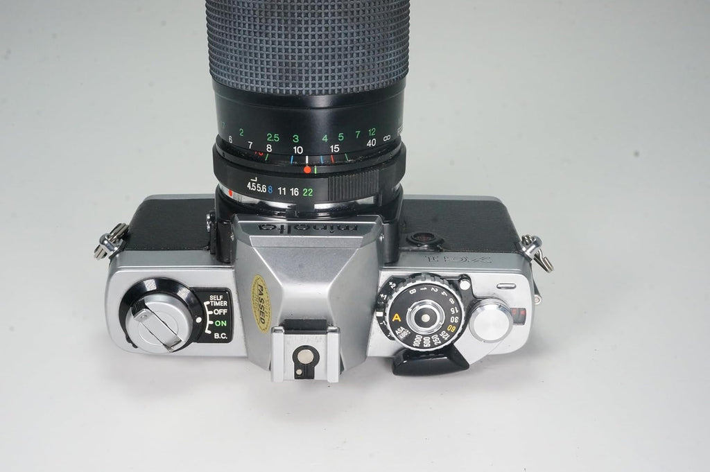 Minolta XG-1 35mm SLR Film Camera Kit with Manual Focus Zoom Lens. (Renewed)