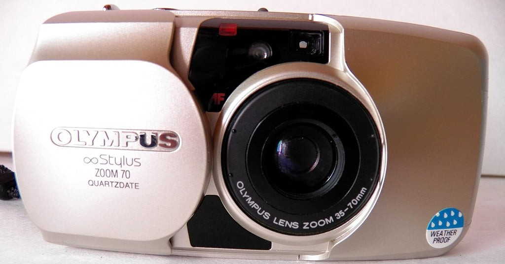 Olympus Infinity Stylus Zoom 70 Point and Shoot 35MM Camera with 35-70mm Lens, Built-in Flash, Auto Film Loader and Counter. Pocket Size.