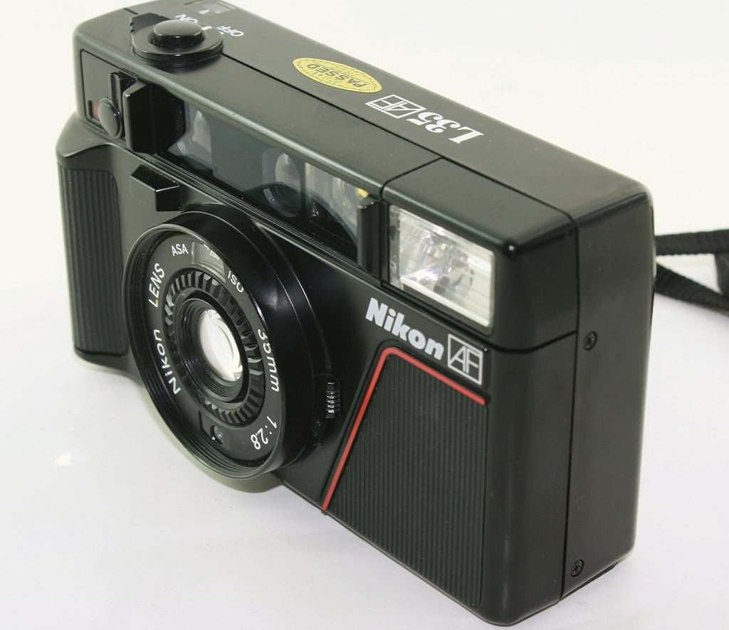 Nikon L35 AF One Touch L35AF Point and Shoot 35MM Film Camera Bulit-in Flash, AF lens, Film loader (Renewed)