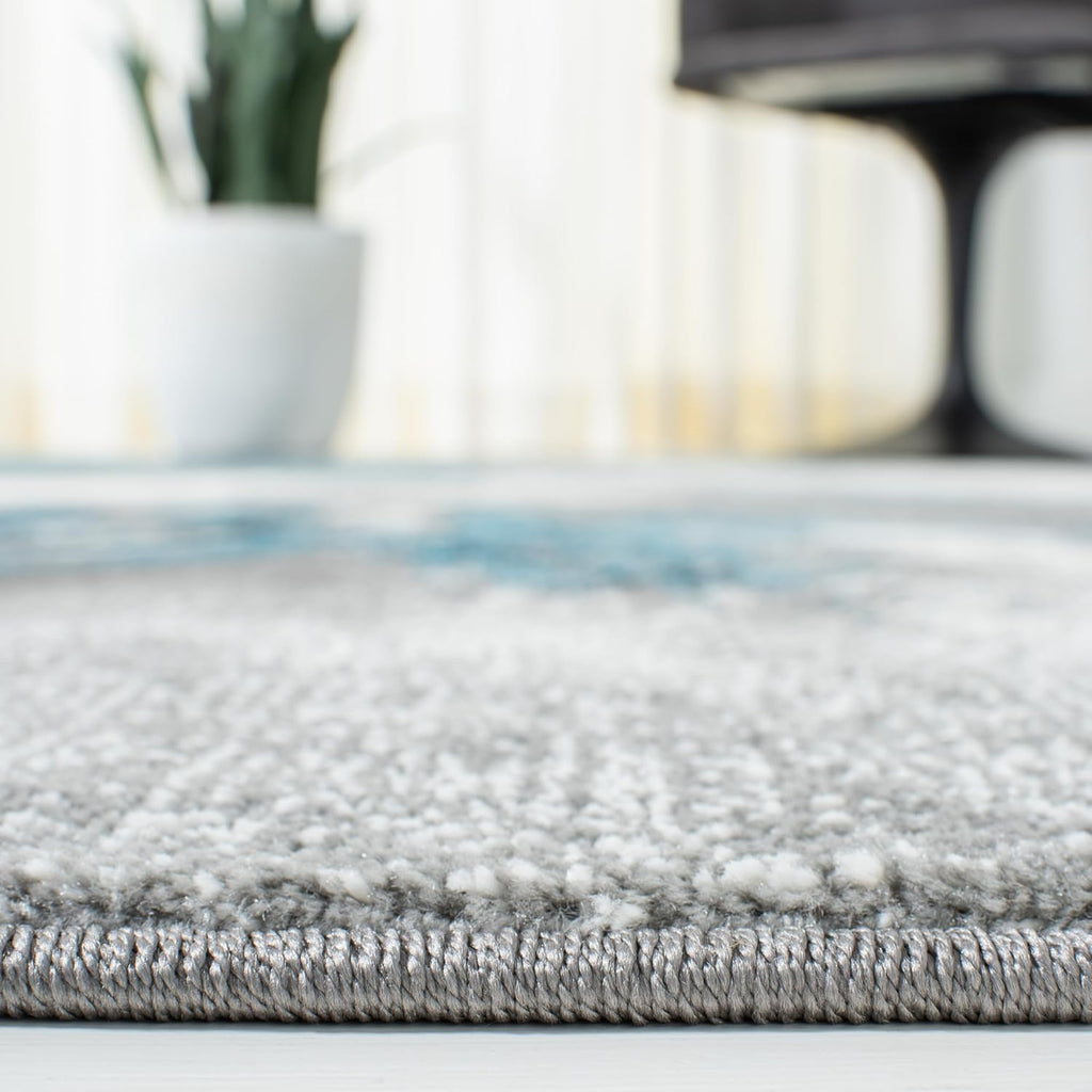 SAFAVIEH Glacier Collection Area Rug - 6'7' x 9', Blue & Grey, Abstract Design, Non-Shedding & Easy Care, Ideal for High Traffic Areas in Living Room, Bedroom (GLA127M)