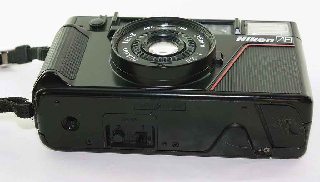 Nikon L35 AF One Touch L35AF Point and Shoot 35MM Film Camera Bulit-in Flash, AF lens, Film loader (Renewed)
