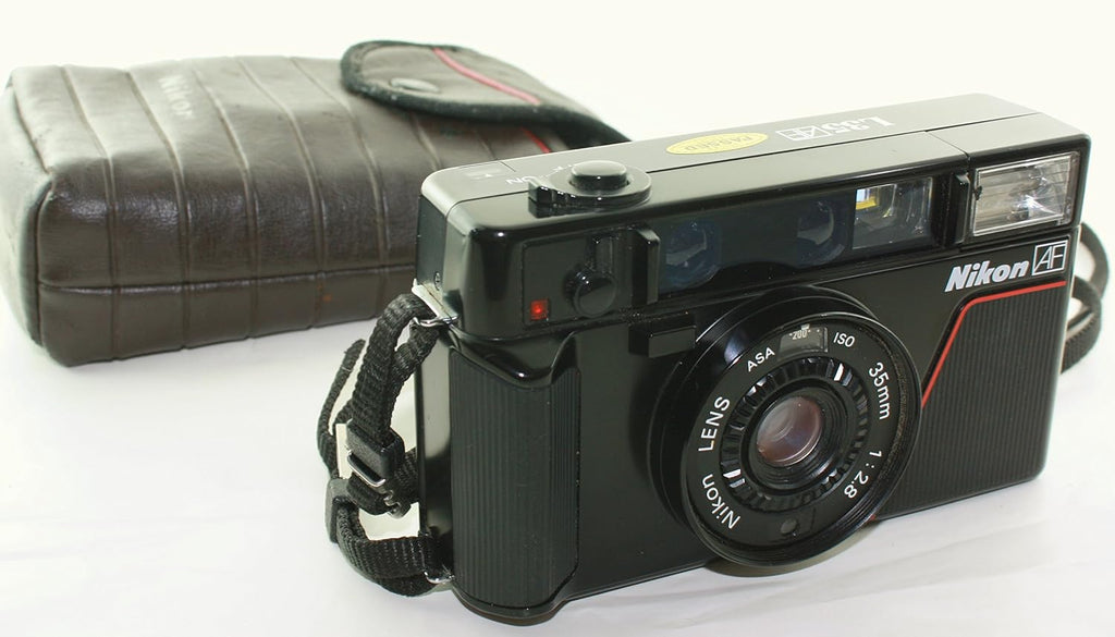 Nikon L35 AF One Touch L35AF Point and Shoot 35MM Film Camera Bulit-in Flash, AF lens, Film loader (Renewed)