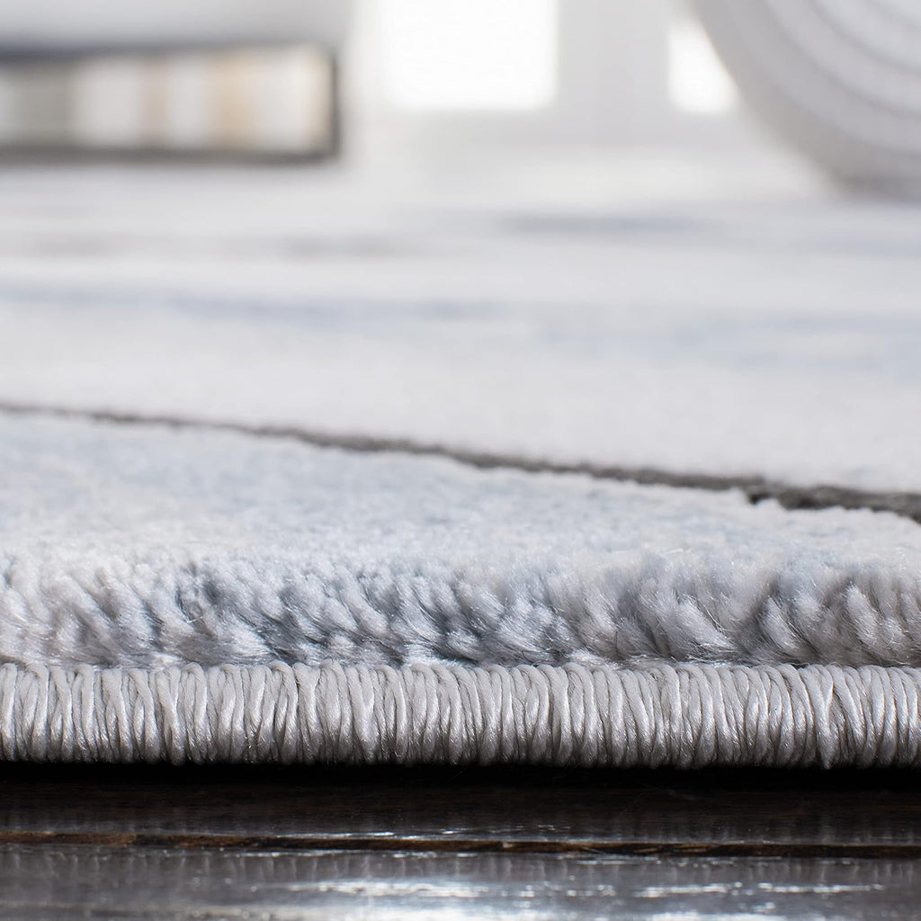 SAFAVIEH Craft Collection Area Rug - 6'7' x 9', Blue & Grey, Modern Abstract Design, Non-Shedding & Easy Care, Ideal for High Traffic Areas in Living Room, Bedroom (CFT819M)