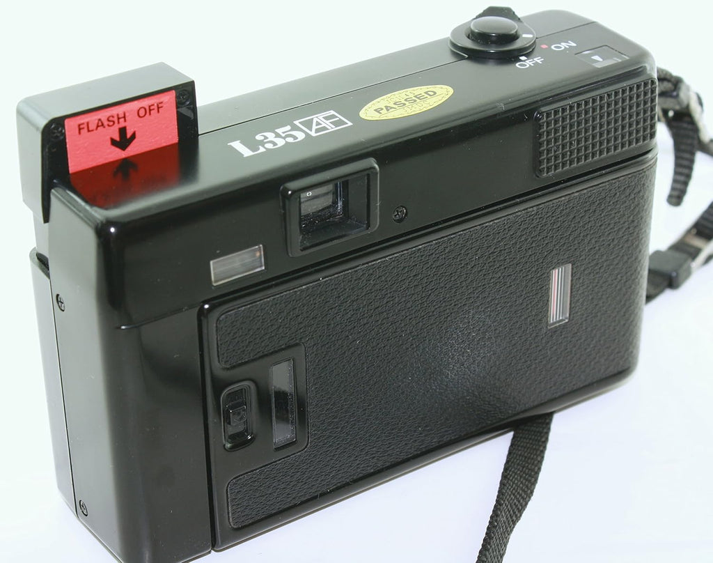 Nikon L35 AF One Touch L35AF Point and Shoot 35MM Film Camera Bulit-in Flash, AF lens, Film loader (Renewed)