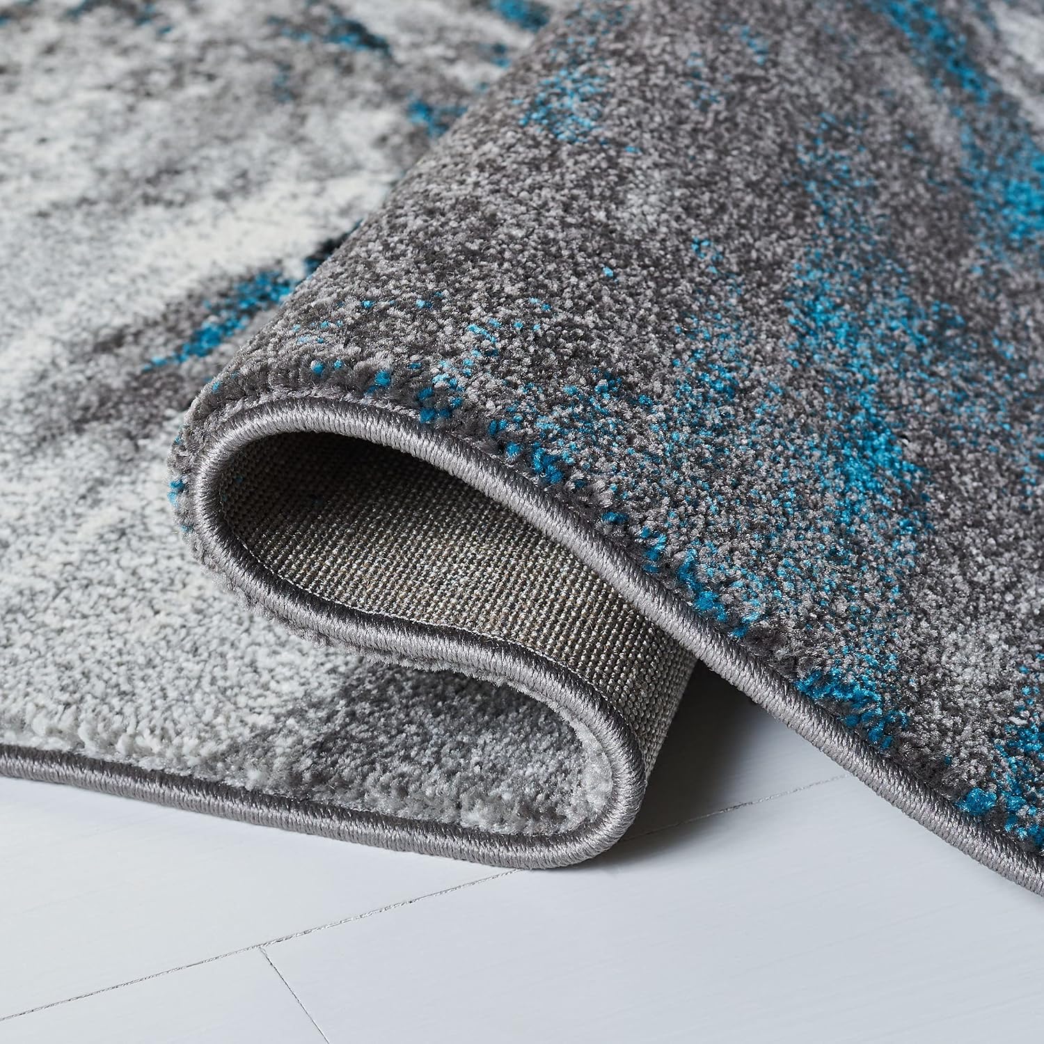 SAFAVIEH Glacier Collection Area Rug - 6'7' x 9', Blue & Grey, Abstract Design, Non-Shedding & Easy Care, Ideal for High Traffic Areas in Living Room, Bedroom (GLA127M)