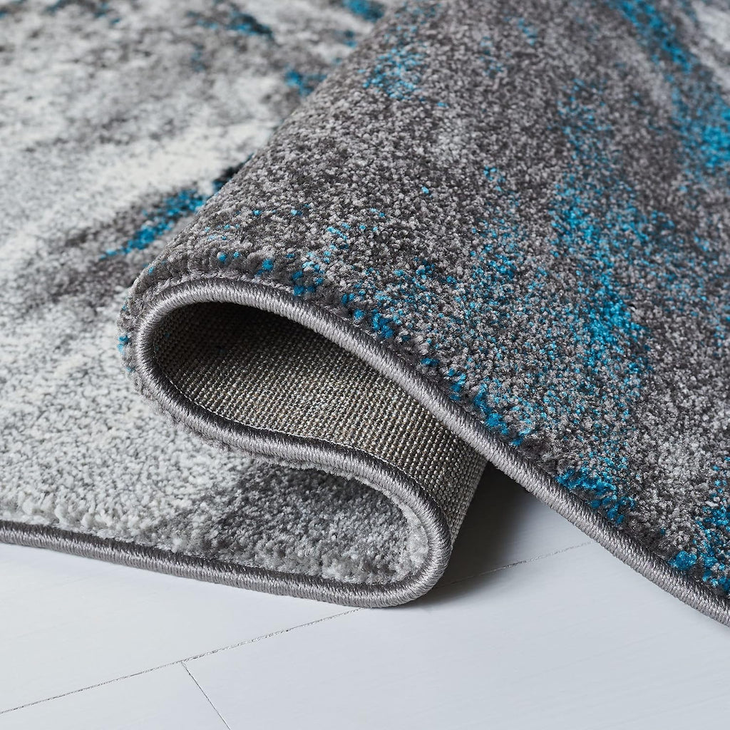 SAFAVIEH Glacier Collection Accent Rug - 2'3' x 4', Blue & Grey, Abstract Design, Non-Shedding & Easy Care, Ideal for High Traffic Areas in Entryway, Living Room, Bedroom (GLA127M)