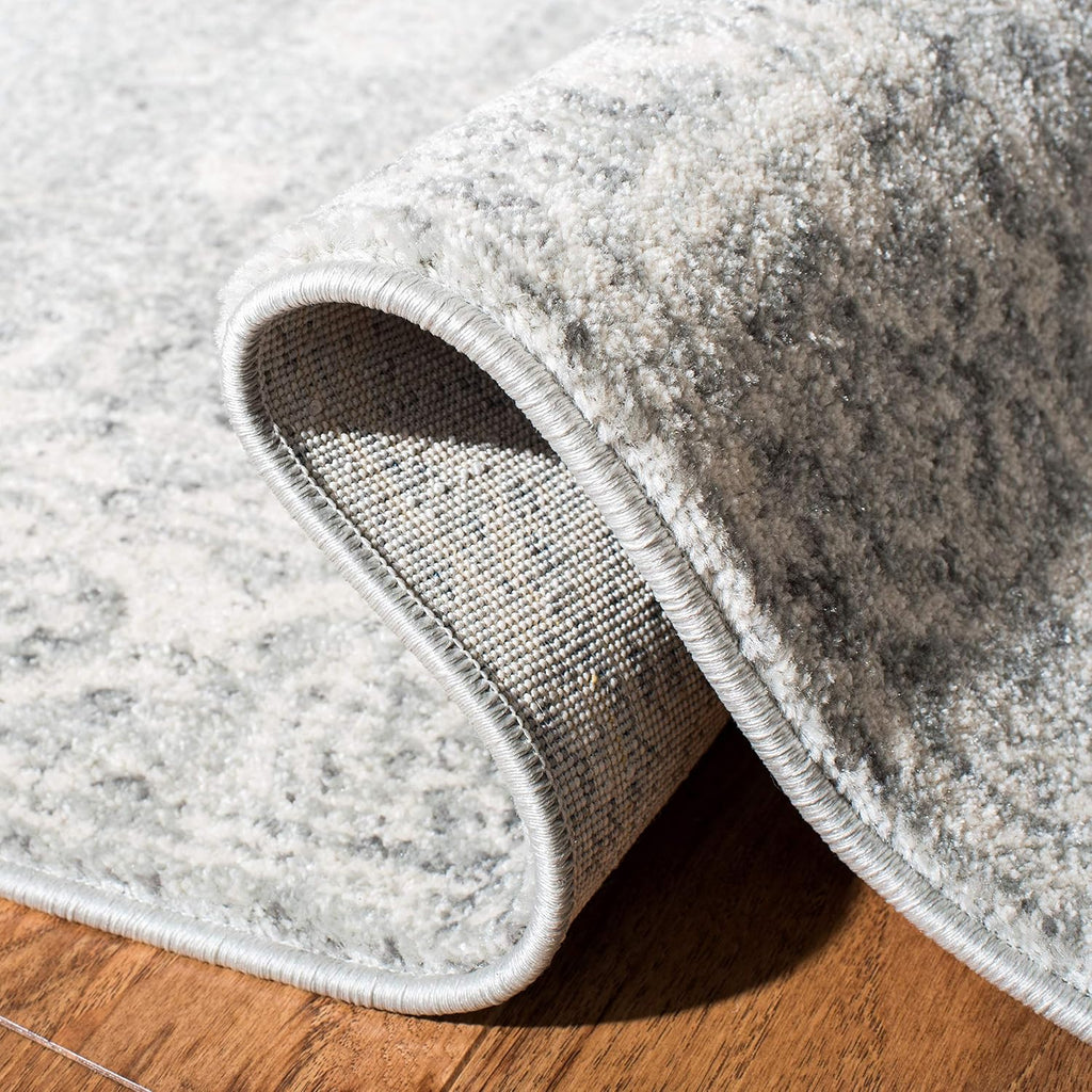 SAFAVIEH Evoke Collection Area Rug - 9' x 12', Silver & Ivory, Shabby Chic Distressed Design, Non-Shedding & Easy Care, Ideal for High Traffic Areas in Living Room, Bedroom (EVK270Z)