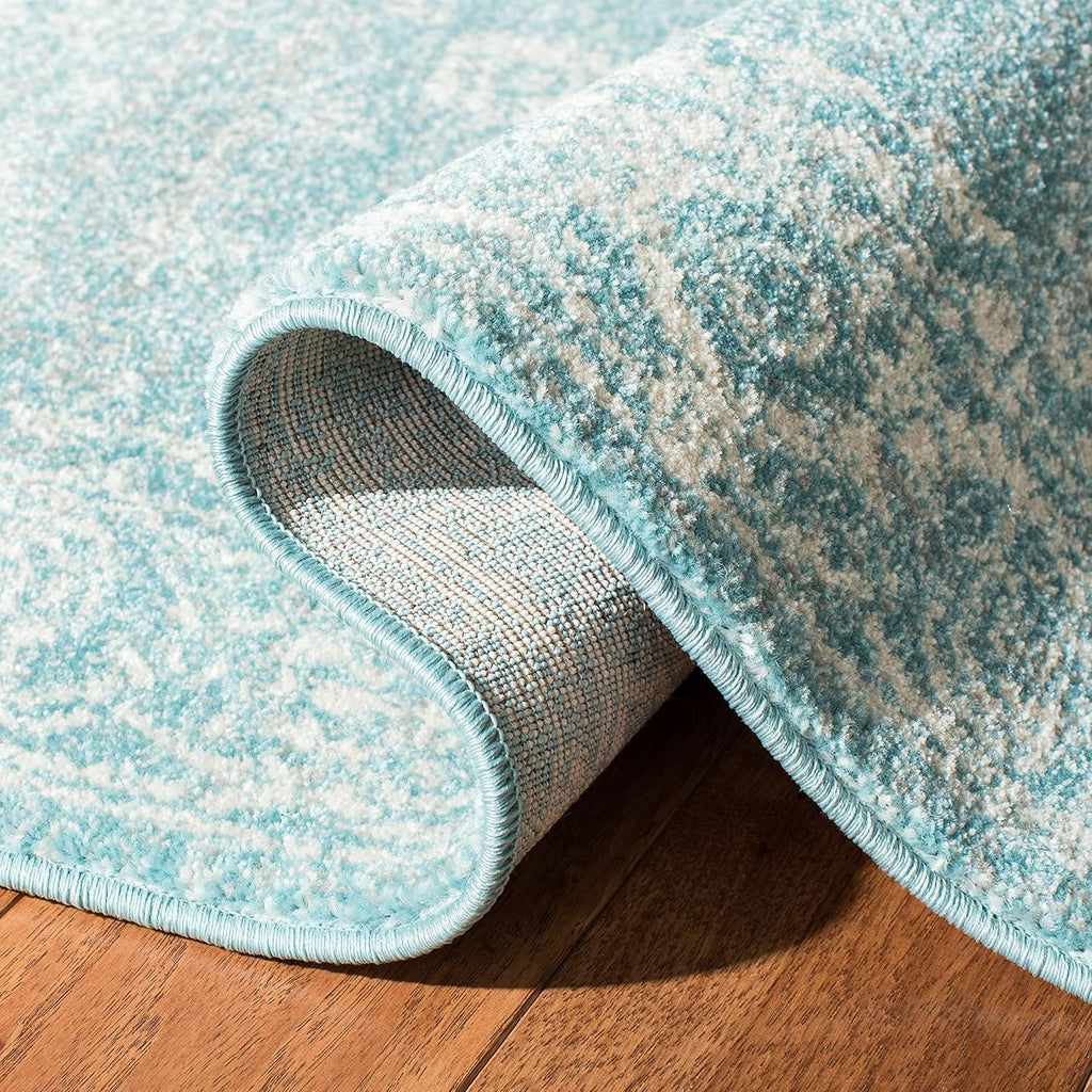 SAFAVIEH Evoke Collection Area Rug - 9' x 12', Light Blue & Ivory, Shabby Chic Distressed Design, Non-Shedding & Easy Care, Ideal for High Traffic Areas in Living Room, Bedroom (EVK270D)