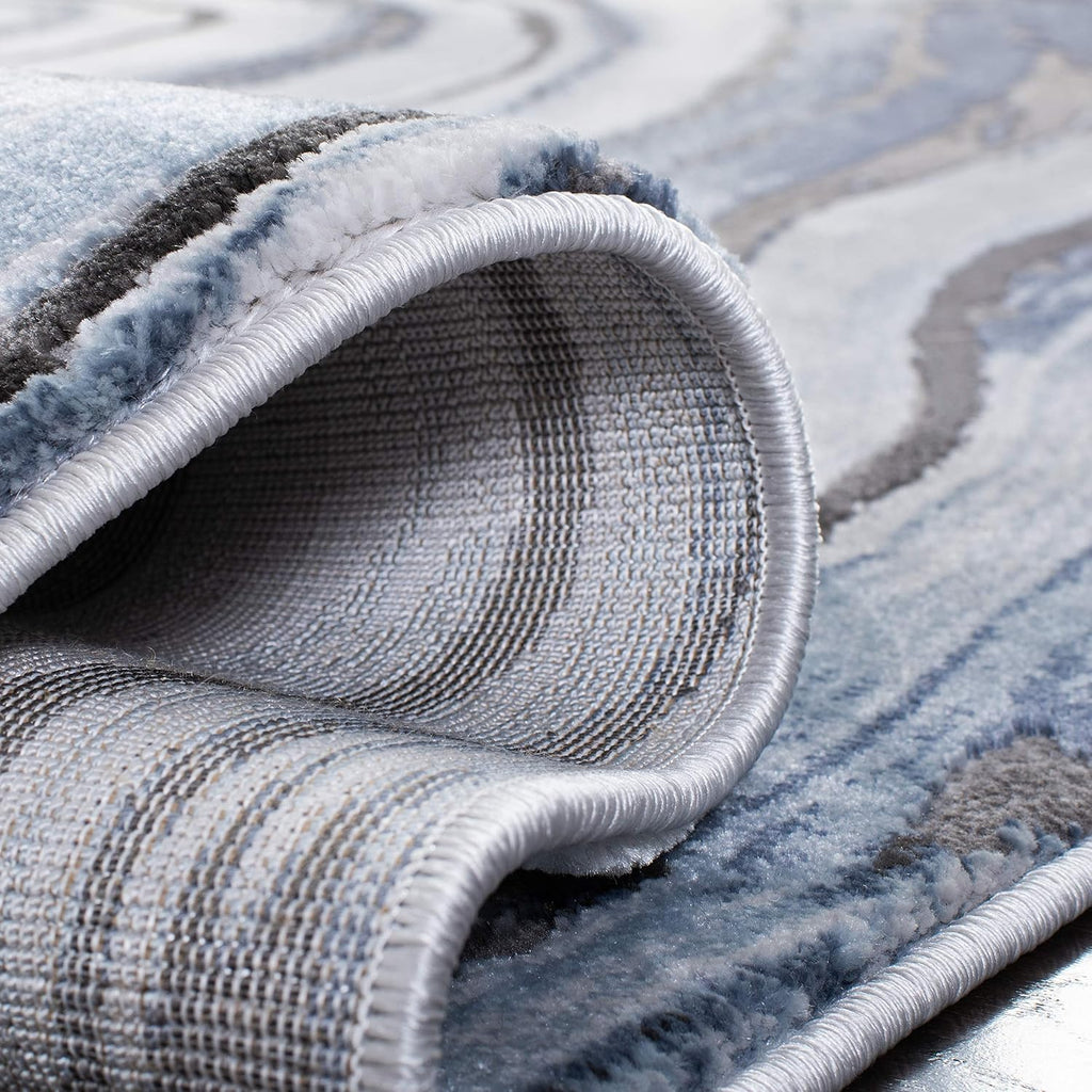 SAFAVIEH Craft Collection Area Rug - 6'7' x 9', Blue & Grey, Modern Abstract Design, Non-Shedding & Easy Care, Ideal for High Traffic Areas in Living Room, Bedroom (CFT819M)