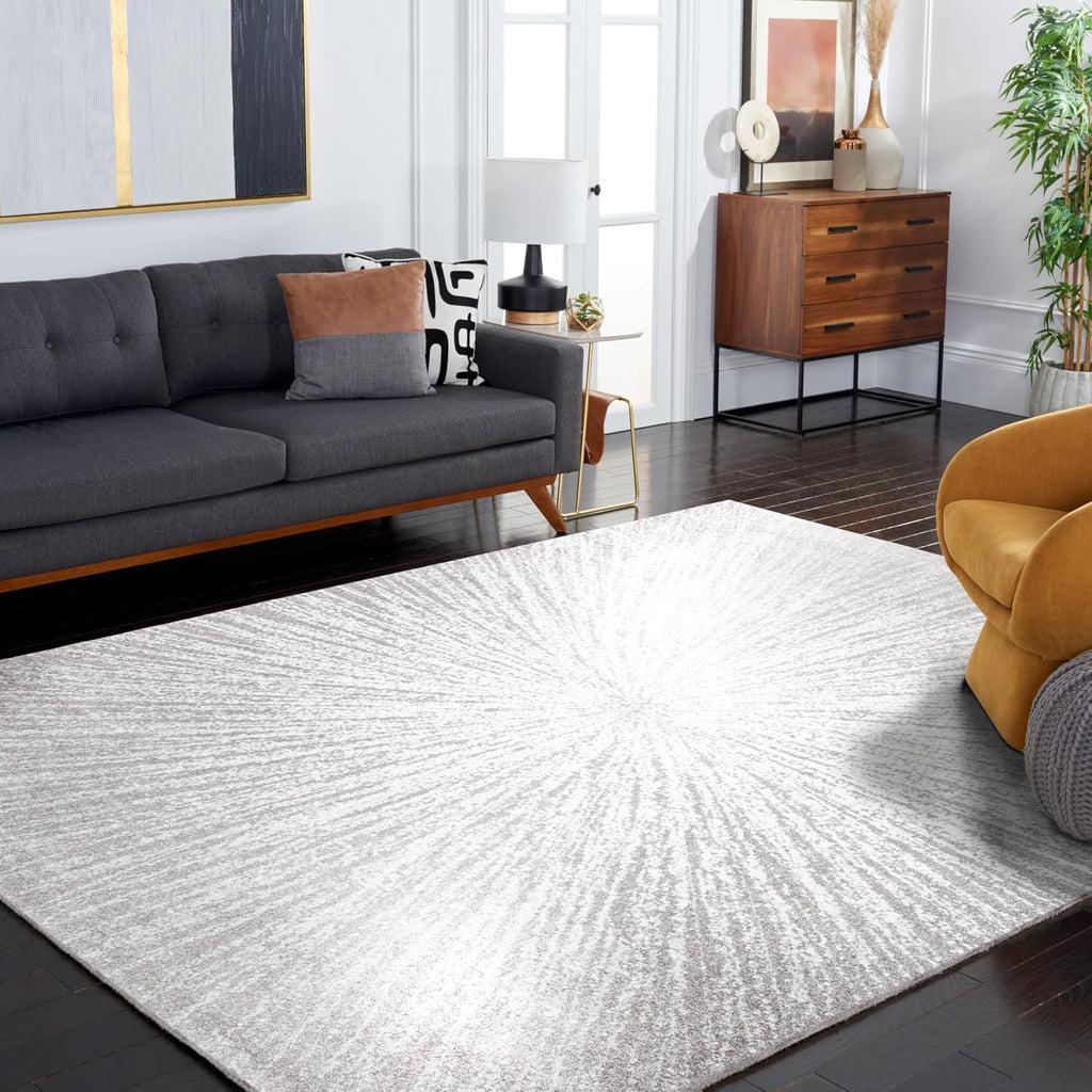 SAFAVIEH Evoke Collection Area Rug - 9' x 12', Dark Grey & Ivory, Abstract Burst Design, Non-Shedding & Easy Care, Ideal for High Traffic Areas in Living Room, Bedroom (EVK228H)
