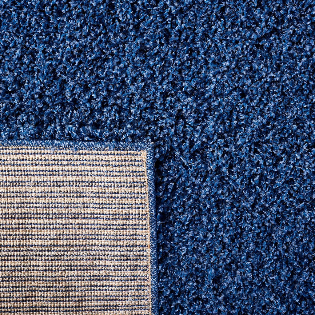 SAFAVIEH Laguna Shag Collection Area Rug - 5'3' x 7'6', Blue, Solid Design, Non-Shedding & Easy Care, 2-inch Thick Ideal for High Traffic Areas in Living Room, Bedroom (SGL303K)