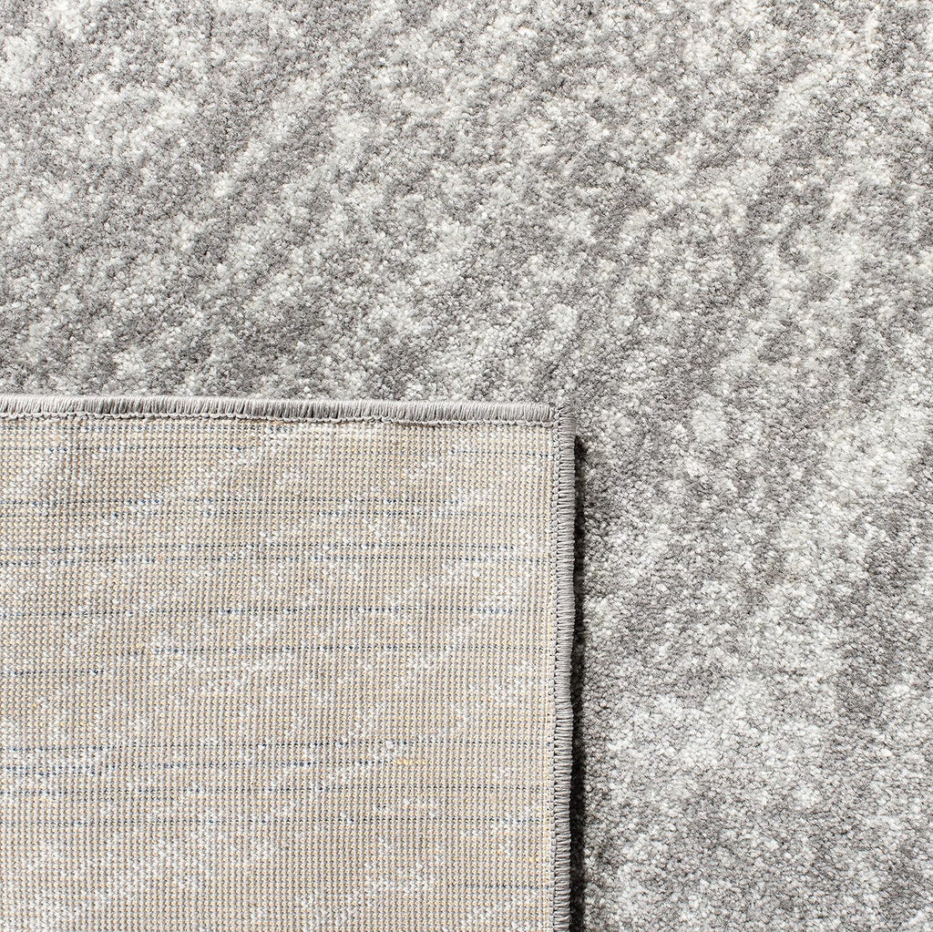 SAFAVIEH Evoke Collection Area Rug - 9' x 12', Dark Grey & Ivory, Abstract Burst Design, Non-Shedding & Easy Care, Ideal for High Traffic Areas in Living Room, Bedroom (EVK228H)